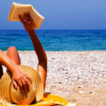 girl-reading-on-beach-md